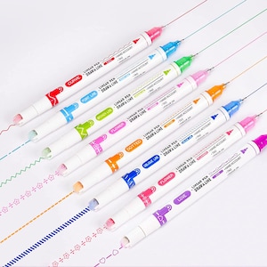 May include: Set of ten colorful linear pens with different line styles, including curve, point, broken, flower, dotted, oblique, flower, and love. Each pen has a white barrel with a colorful cap and a clear tip. The pens are arranged in a row on a white background.