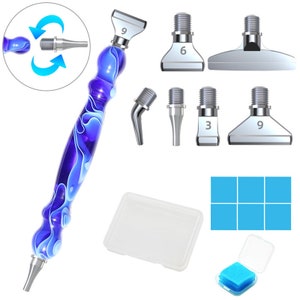 May include: A blue and purple swirl design pen with interchangeable tips. The pen comes with a variety of tips, including a flat tip, a round tip, and a pointed tip. The pen also comes with a small container of blue cleaning pads.
