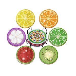 May include: Set of six colorful fruit-themed coasters with a metal stand. The coasters feature a lemon, orange, lime, kiwi, watermelon, and a purple flower design.