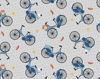 May include: A seamless pattern featuring blue bicycles with white baskets and dogs on a light gray background with white polka dots. The bicycles have white tires and brown handlebars. The dogs are white with black spots. The pattern is repeated throughout the image.