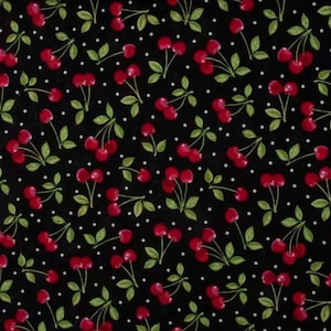 May include: Black fabric with a repeating pattern of red cherries, green leaves, and white polka dots. The cherries are clustered in groups of two or three, with some single cherries scattered throughout the design. The leaves are a muted green.