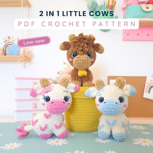 May include: Three plush cow toys made of soft yarn. One brown cow stands on a yellow basket, while a white cow with pink spots and a white cow with blue spots sit in front. Text reads 2 IN 1 LITTLE COWS PDF CROCHET PATTERN and Low-sew.