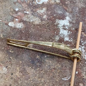BRASS-Nauheim Celtic bow fibula. 3.26&quot;