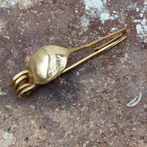BRASS-Nauheim Celtic bow fibula. 2.56&quot;