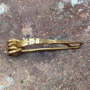 BRASS-Nauheim Celtic bow fibula. 2.16&quot;