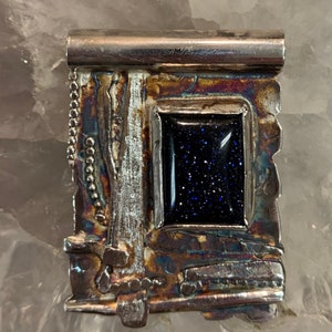Blue goldstone pendant