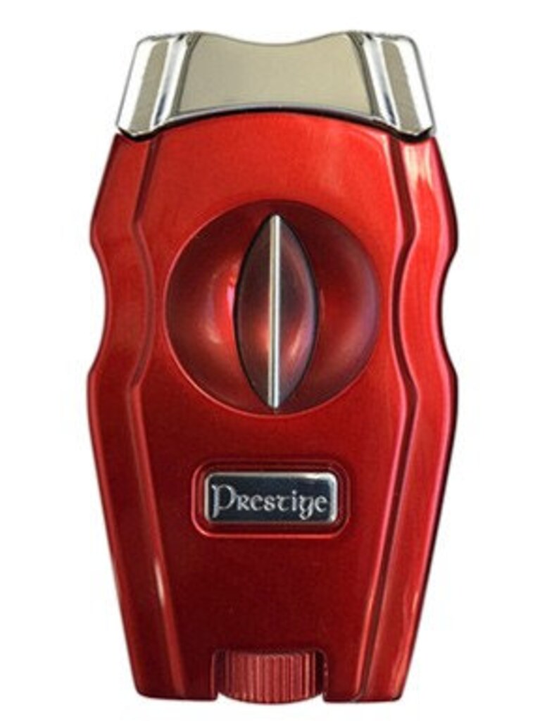May include: Red cigar cutter with a silver top and a silver Prestige logo. The cutter has a round opening for cutting cigars.