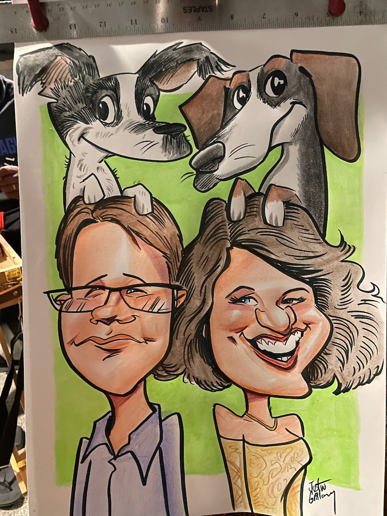 May include: A caricature drawing of a couple with two dogs. The couple is smiling and the dogs are looking up at them. The drawing is done in a cartoon style with exaggerated features. The background is a light green color.