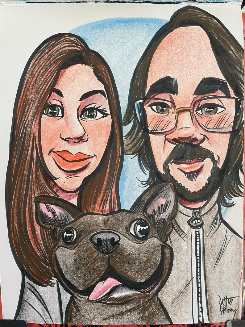 May include: A caricature drawing of a couple with their dog. The woman has long brown hair and is wearing a white shirt. The man has brown hair and is wearing a gray zippered jacket. The dog is a brown and black French Bulldog.