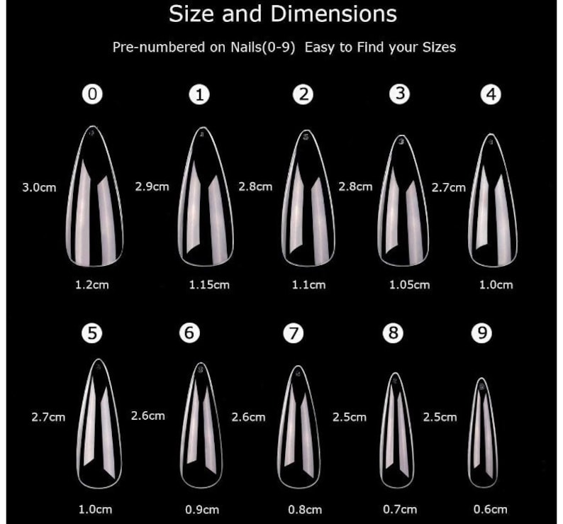 May include: A set of ten clear acrylic false nails in different sizes, numbered 0-9. Each nail is shaped like a stiletto and has measurements in centimeters for length and width.
