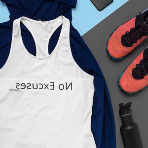 May include: White athletic tank top with the text "NO EXCUSES" in black. The tank top is paired with a navy blue jacket, coral running shoes, a black water bottle, and a smartphone with earbuds. The items are arranged on a blue and gray surface.