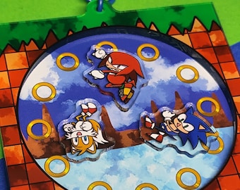 Amuletos Shaker del Equipo Sonic y del Equipo Dark