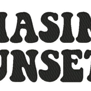May include: Black and white text graphic with the words "CHASING SUNSETS" in a retro font style.