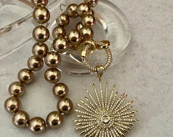 Hand Knotted Bronze Pearl Necklace – Gold Micro Pave Sunburst Pendant