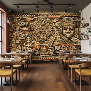 May include: A restaurant interior featuring a large mural depicting Aztec art. The mural is composed of brick and stone, showcasing detailed carvings of the Aztec calendar, pyramids, and mythical creatures. Wooden tables and yellow chairs are arranged in front of the mural.