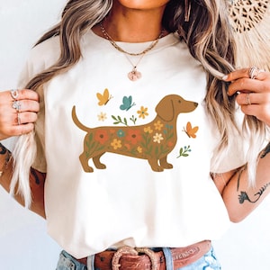 Teckel floral lunatique PNG, conception de chemise pour chien saucisse fumée papillon, Sublimation Boho pour animaux de compagnie Clipart, graphique de chien mignon Cottagecore