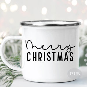 May include: White enamel mug with a black inscription that reads "Merry Christmas".