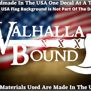 May include: White vinyl decal featuring the text "VALHALLA BOUND" and a stylised axe. The decal is on a blurred background of the American flag.