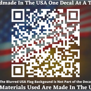 May include: A white QR code on a blurred background of the American flag. The text "Handmade In The USA One Decal At A Time" is at the top of the image. The text "The Blurred USA Flag Backgound is Not Part of the Decal" is below the QR code. The text "All Materials Used Are Made In The USA" is at the bottom of the image.