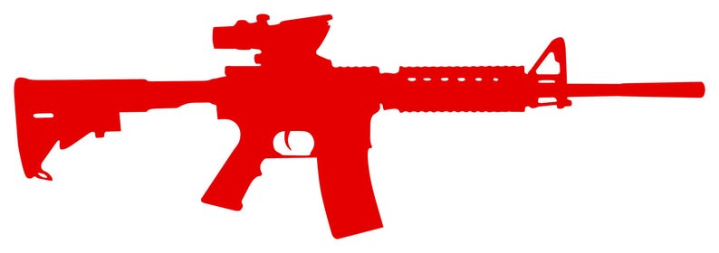 May include: A red silhouette of a rifle, with a scope, magazine, and stock. The weapon's design includes a barrel, handguard, and a pistol grip. The image is a solid red colour against a white background.