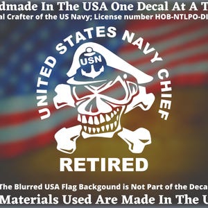 May include: White decal featuring a skull wearing a US Navy Chief hat, with the words "UNITED STATES NAVY CHIEF" and "RETIRED." The background is a blurred American flag. Text at the top reads "Handmade In The USA."