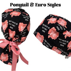 May include: Black surgical scrub cap with a pink bow and a Euro style cap. The caps are patterned with smiling pink organs and the text "THEY HATE US CUZ THEY ANUS". The text "Ponytail & Euro Styles" is at the top.