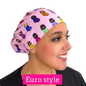 May include: A pink surgical scrub cap with a repeating pattern of cartoon pregnant women in various outfits. The cap is worn by a person. The text "Euro style" is in a pink rectangle at the bottom.