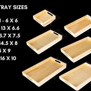 Puede incluir: Se muestran seis bandejas de madera de diferentes tama&ntilde;os, cada una con forma rectangular y asas recortadas. Los tama&ntilde;os var&iacute;an de 15,2 cm x 15,2 cm a 40,6 cm x 25,4 cm, como indica el texto "6 TRAY SIZES". Las bandejas son de madera clara.