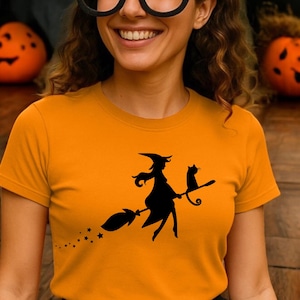 Flying Witch Halloween Shirt: Spooky Season Women&#39;s Tee