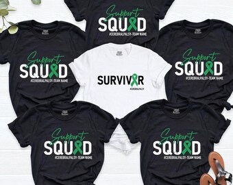 May include: Four black t-shirts and one white t-shirt. The black shirts feature the text Support SQUAD with a green ribbon replacing the letter A and the hashtag #CEREBRALPALSY-TEAM NAME. The white shirt says SURVIVOR with a green ribbon.