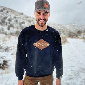TOYOTA Unisex Heavy Blend Crewneck Sweatshirt
