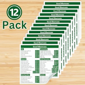 May include: A pack of 12 Excel shortcut reference cards. Each card features a green header with the text "Excel Shortcuts" and a detailed list of keyboard shortcuts for various Excel functions, including file operations, formatting, and grid operations.