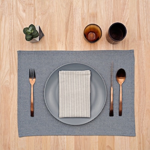 Wellcrafted set of 4 cloth placemats, premium cotton blend, stylish table linens for dining, eco-friendly fabric mats in assorted colors, washable home decor accessories, sustainable kitchen essentials.