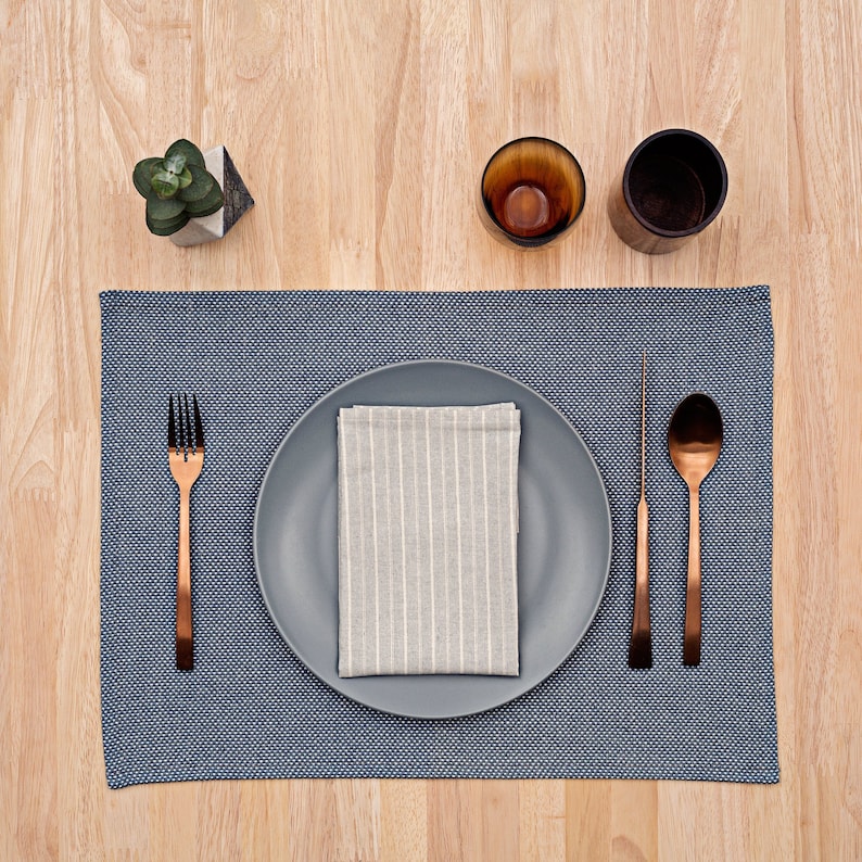 Wellcrafted set of 4 cloth placemats, premium cotton blend, stylish table linens for dining, eco-friendly fabric mats in assorted colors, washable home decor accessories, sustainable kitchen essentials.