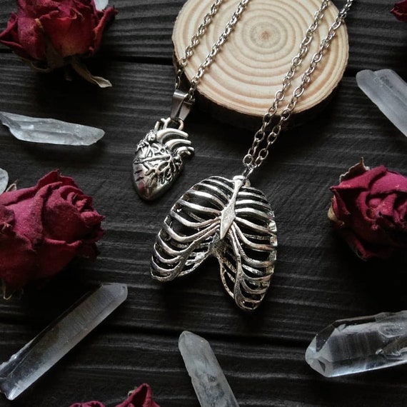 Heart cage necklace discount