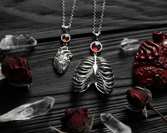 Anatomical Rib Cage Necklace: Gothic Heart Pendant with Garnet