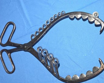 Hanging Metal Fish made from Repurposed Ice Tongs and Wrenches