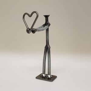 Welded nuts and bolts style figure holding heart image 1