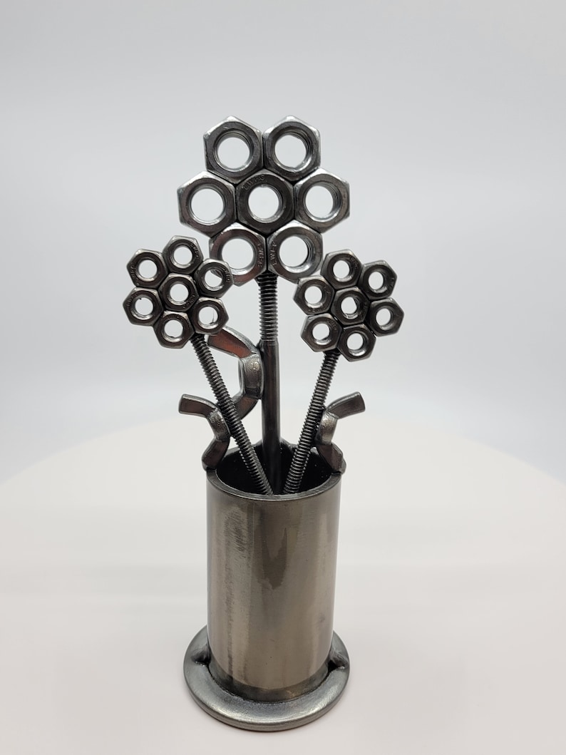 Metal vase with three nuts and bolts style welded flowers image 2