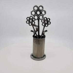 Metal vase with three nuts and bolts style welded flowers image 3