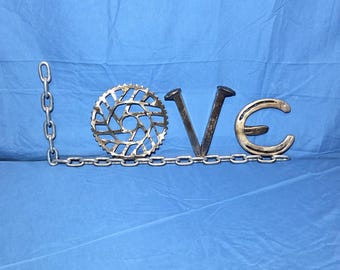 Welded Repurposed Metal "Love" Sign v1