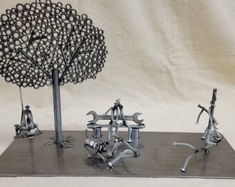 Nuts and bolts park scene sculpture