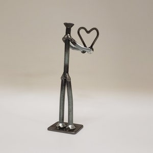 Welded nuts and bolts style figure holding heart image 3