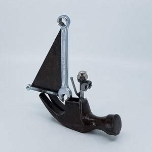 Welded metal nuts and bolts Hammer Sailboat