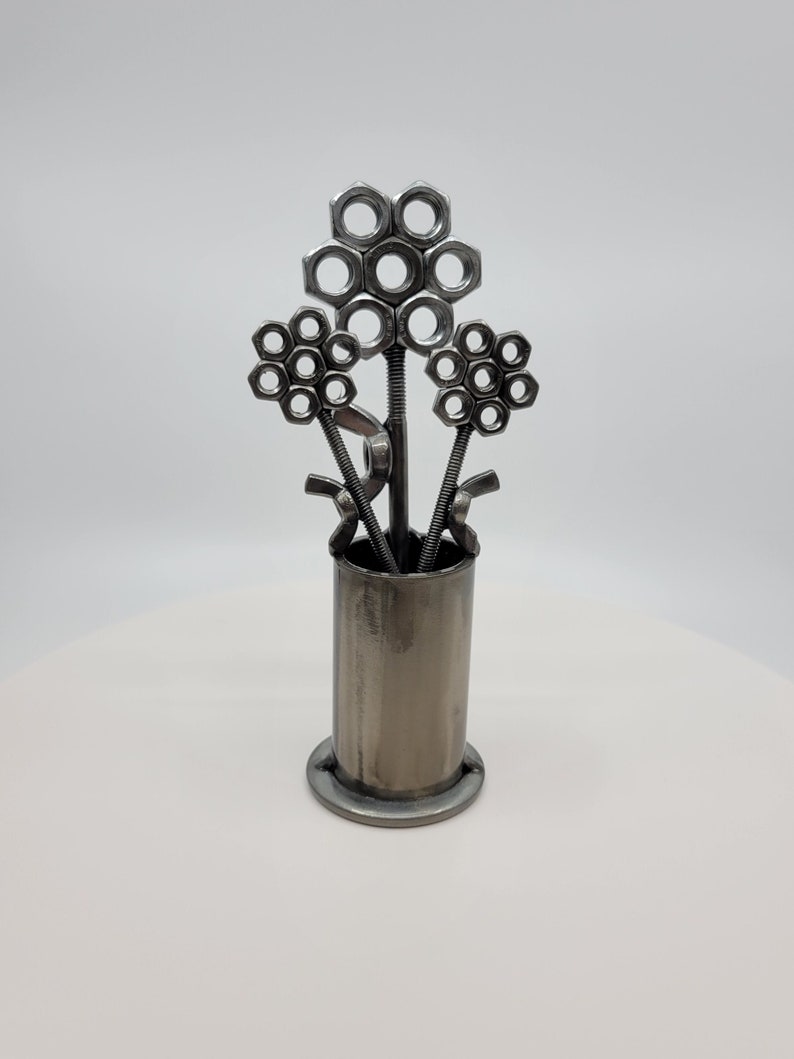 Metal vase with three nuts and bolts style welded flowers image 1