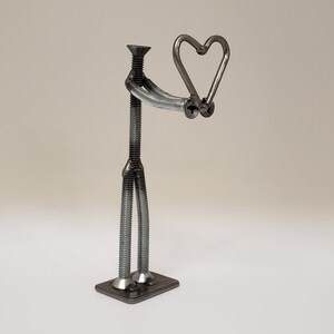 Welded nuts and bolts style figure holding heart image 2