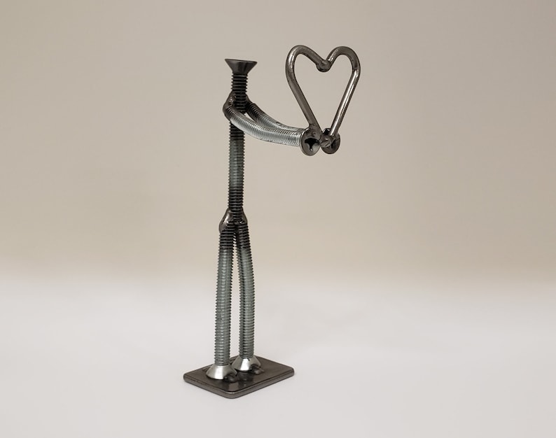 Welded nuts and bolts style figure holding heart image 2