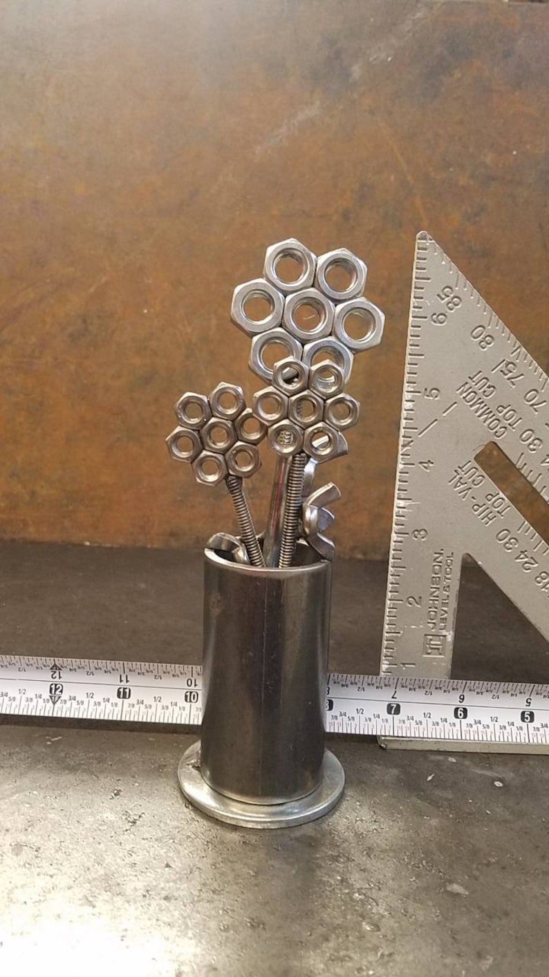 Metal vase with three nuts and bolts style welded flowers image 6