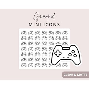 Op de afbeelding: Vel heldere en matte mini-icoonstickers met een gamepad-ontwerp. De vel bevat meerdere kleine gamepad-iconen en een grotere. De tekst "Gamepad Mini Icons" staat bovenaan, met "Clear & Matte" onderaan.