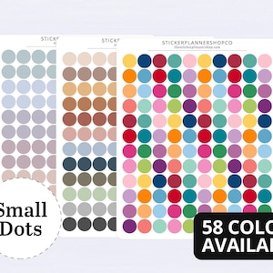 May include: Three sheets of small circular adhesive stickers featuring a wide variety of colours including muted tones, earth shades, and vibrant hues. Each sheet is labelled with the text STICKERPLANNERSHOPCO and the website address.